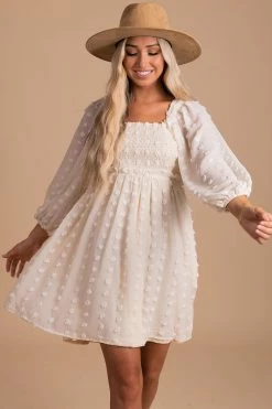 Listicle Into A Reverie Swiss Dot Mini Dress