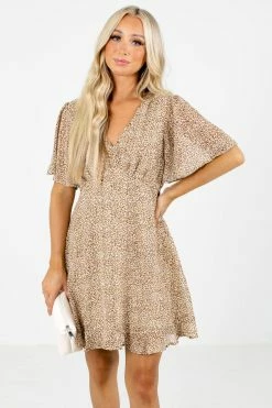 In Loom On The Prowl Beige Leopard Print Mini Dress 15 In Loom On The Prowl Beige Leopard Print Mini Dress -bella ella boutique shop On the Prowl Beige Dress Front 5000x